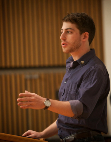 student delivering a presentation