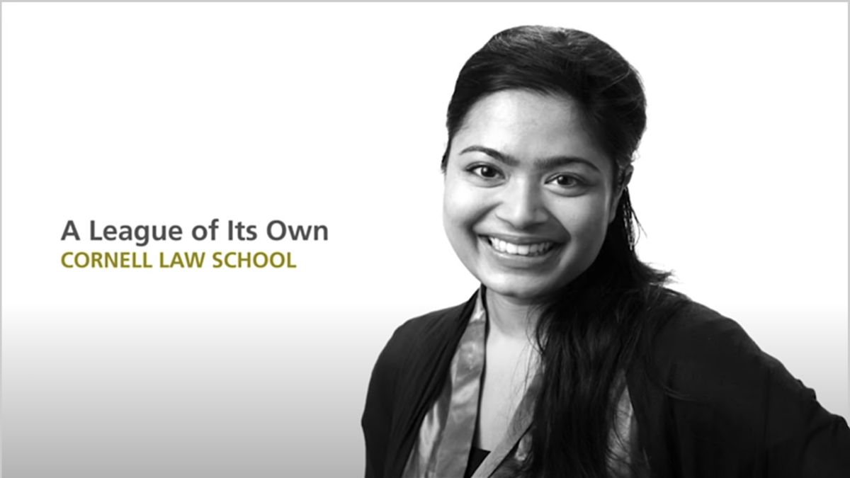 A smiling female student alongside text that reads "A League of Its Own Cornell Law School"