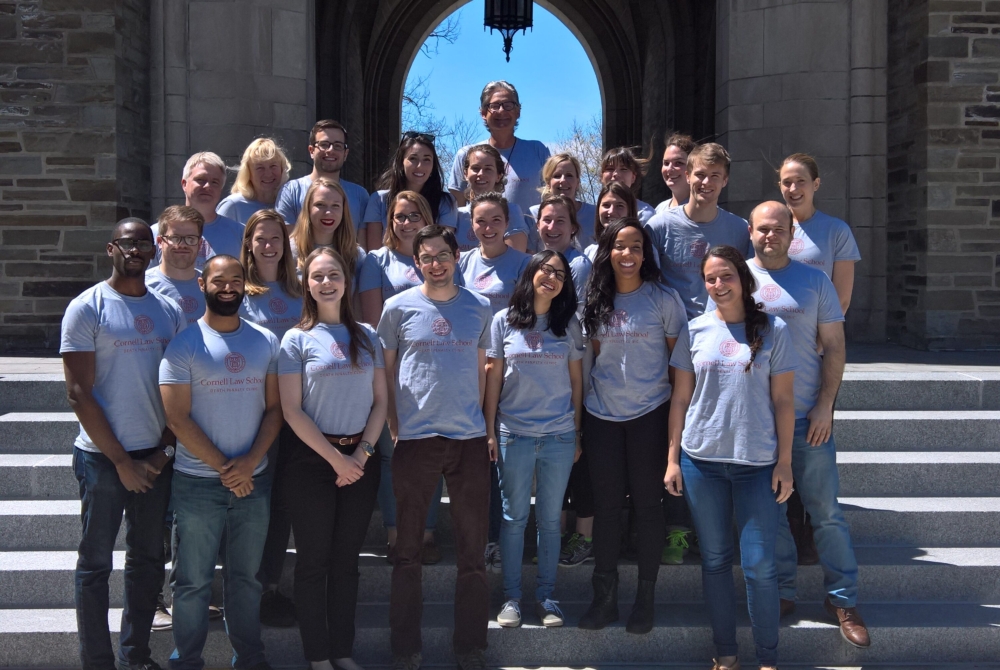 group of students in matching shirts outside the Law school