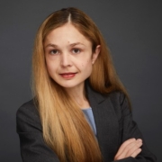 Janine Prantl on dark gray background