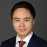 Noah Qiao on dark gray background