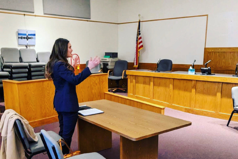 woman presenting in court