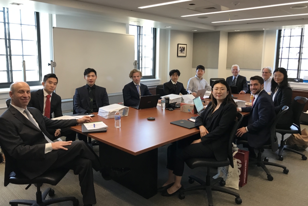 students seated around a table