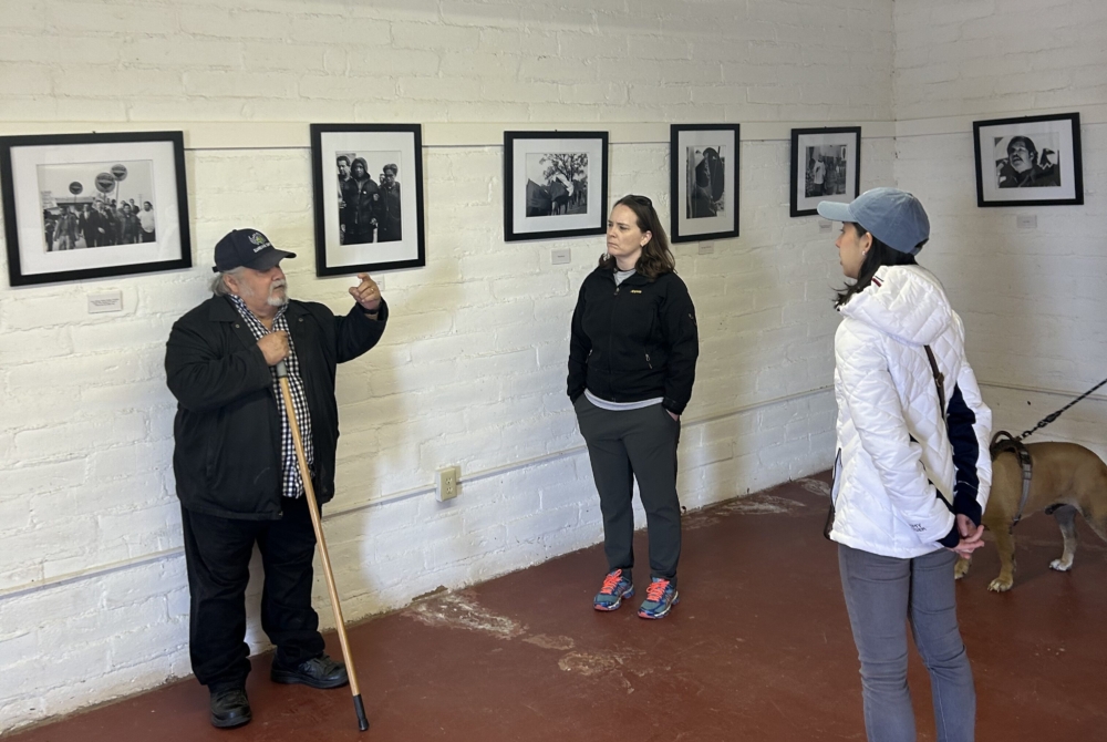 man leading a tour for students