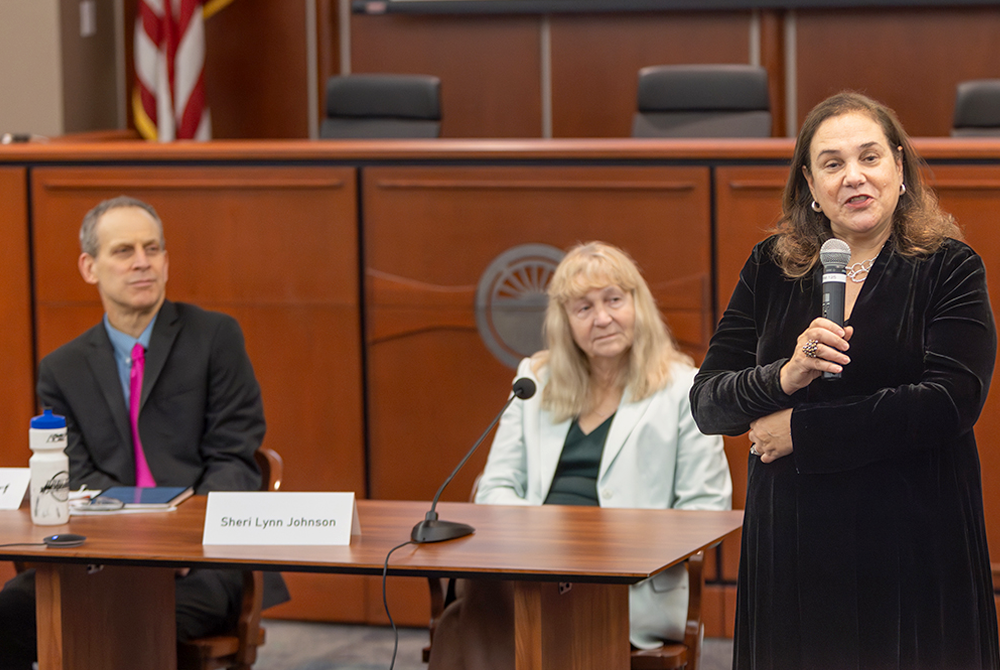 Professor Penny Venetis, along with Sheri Johnson and Michael Dorf during panel discussion.