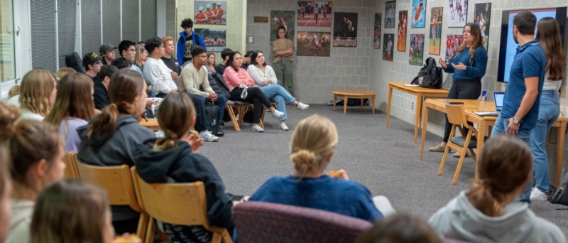 Students in a new Cornell Law School practicum run a financial literacy training for student-athletes in Bartels Hall on Oct. 26.