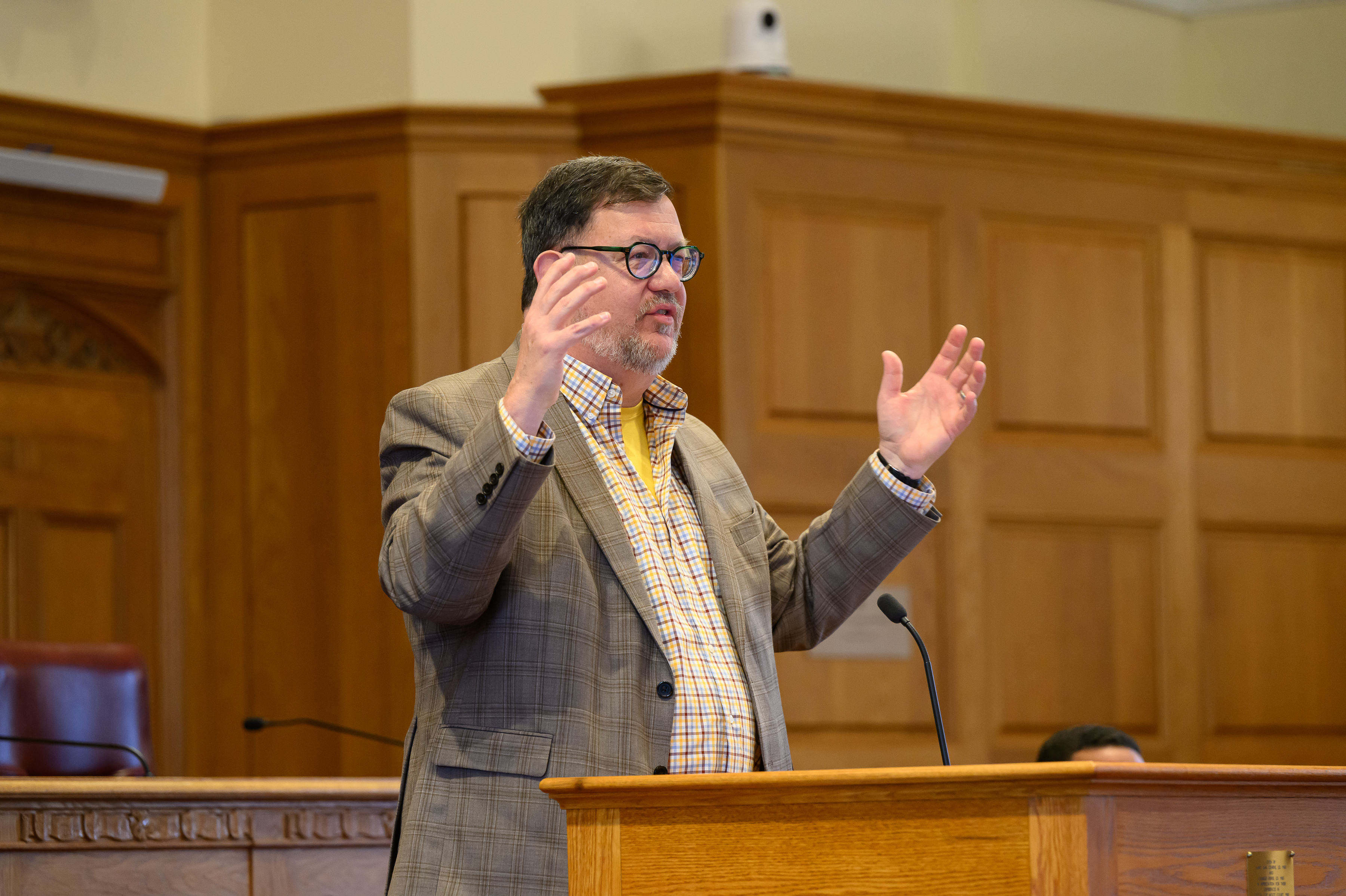 Brad Wendel presenting at a podium