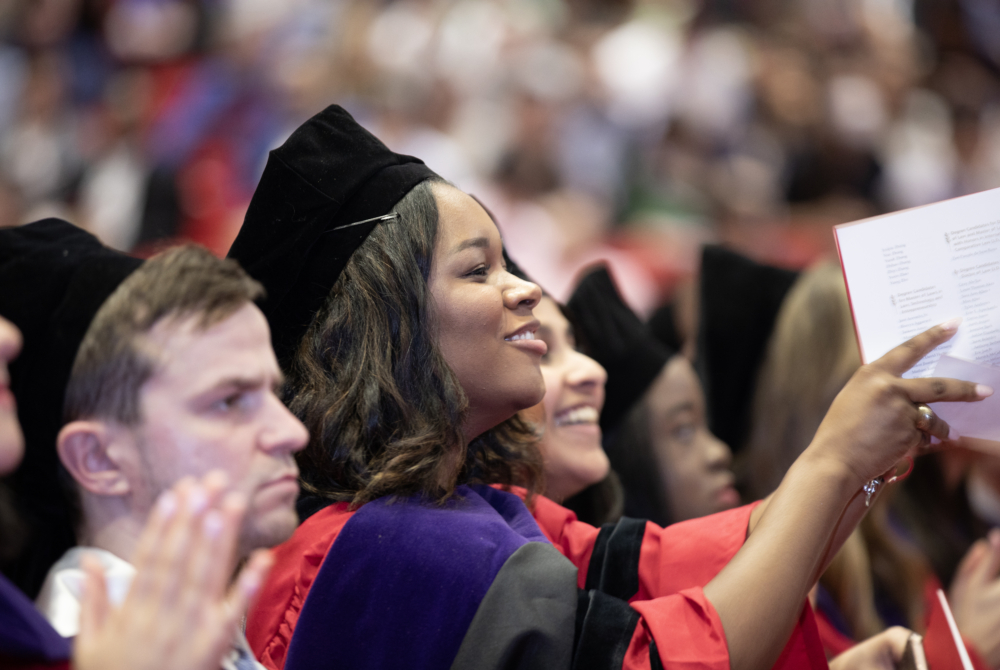 a student clapping