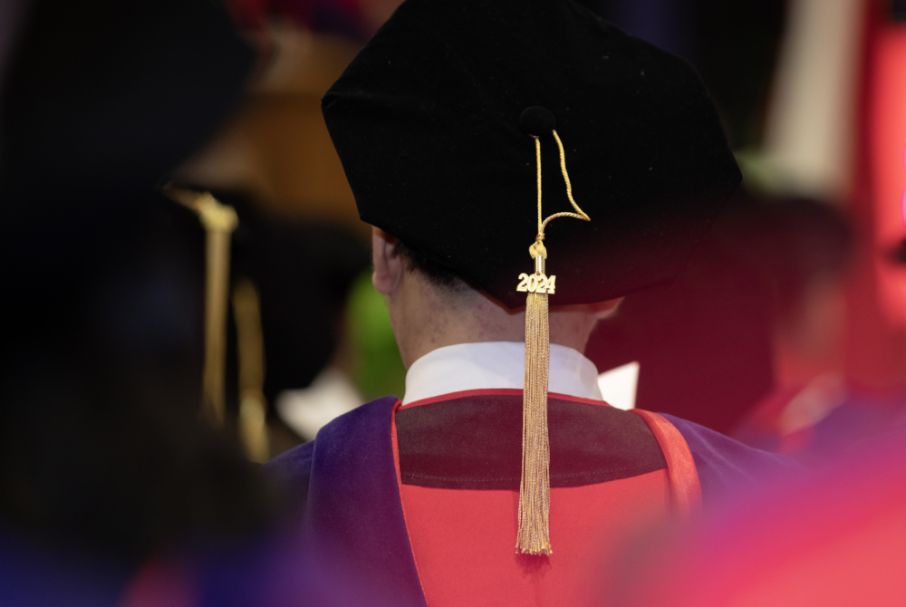 a zoomed in image of the back of a student's hat with the year 2024 on it