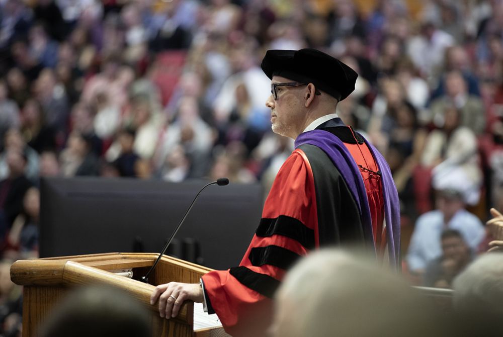 Dean Ohlin giving speech at graduation