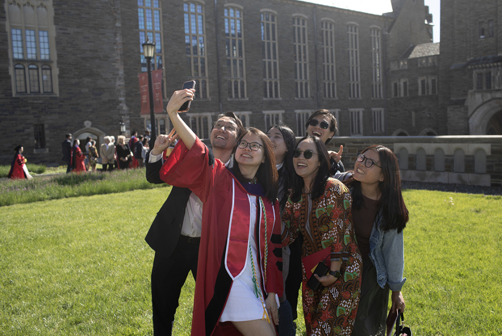 a group of students pose for a selfie together