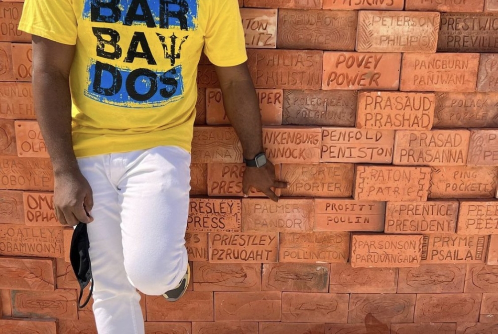 The Porte name is honored on the Builders of Barbados Wall, someone in the image is pointing to it.