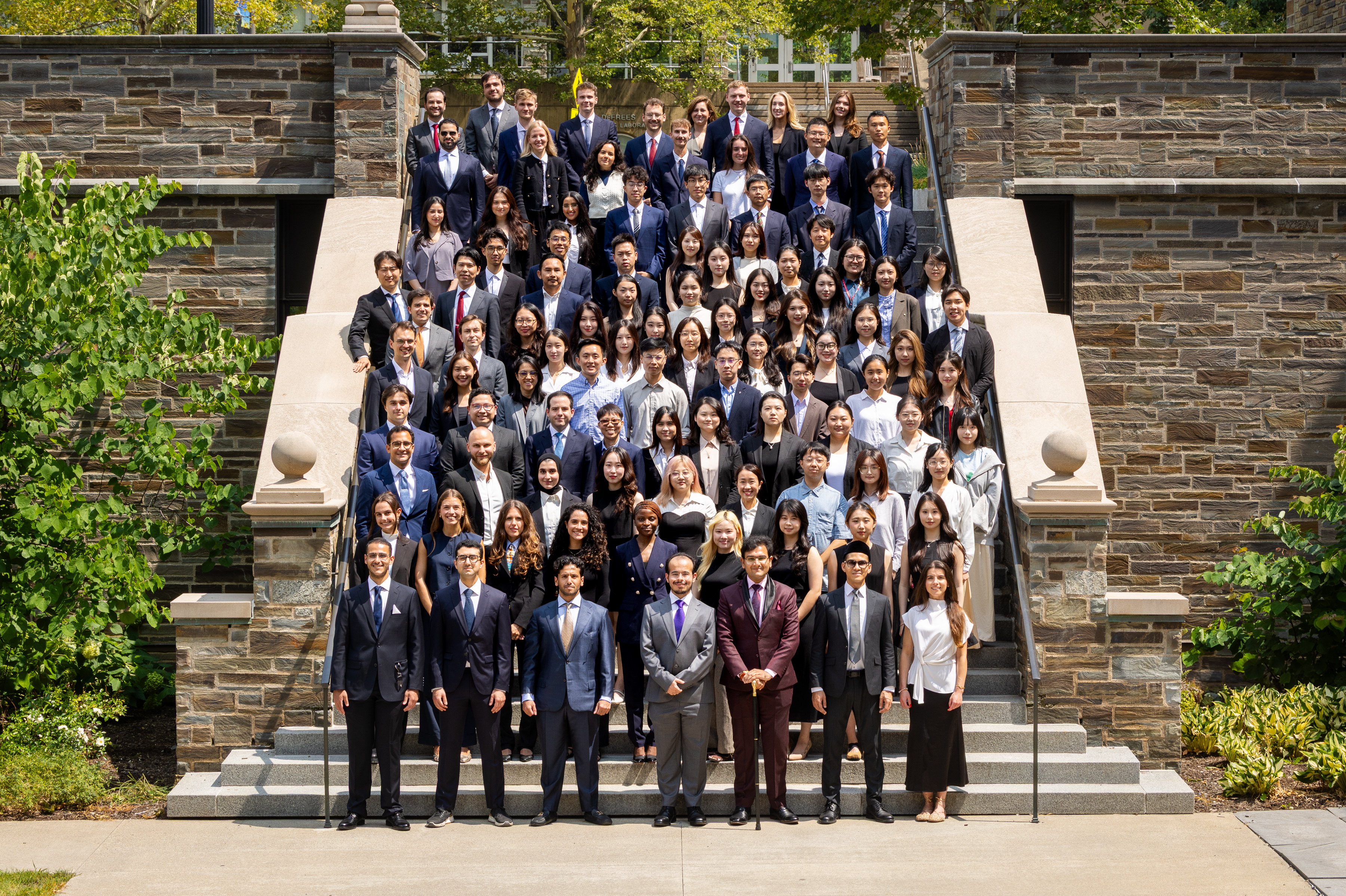 class photo of 2025 llm class outside in courtyard of law school