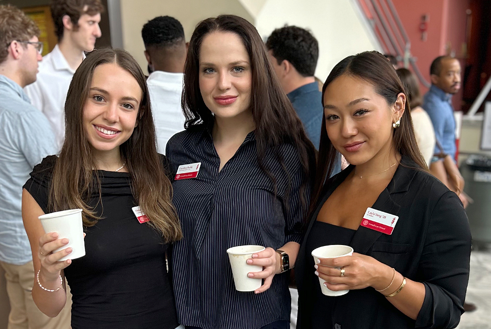 three students posing for photo