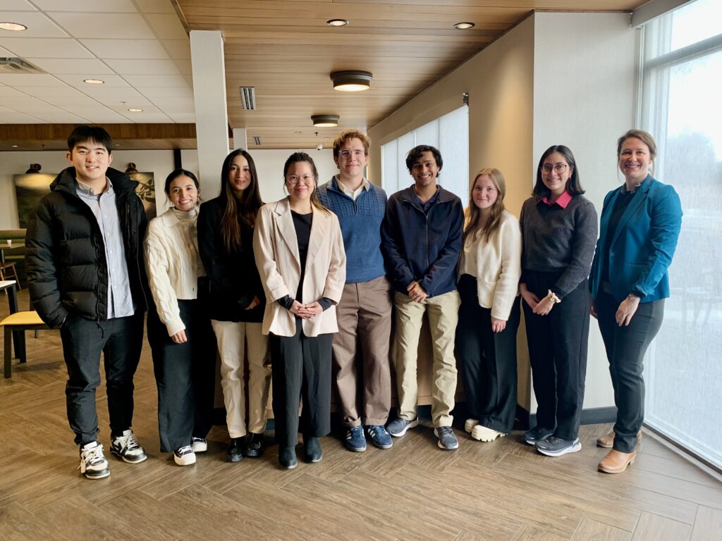 group shot of students with professor kelley-widmer