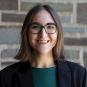 Rosalind Major with brick background.