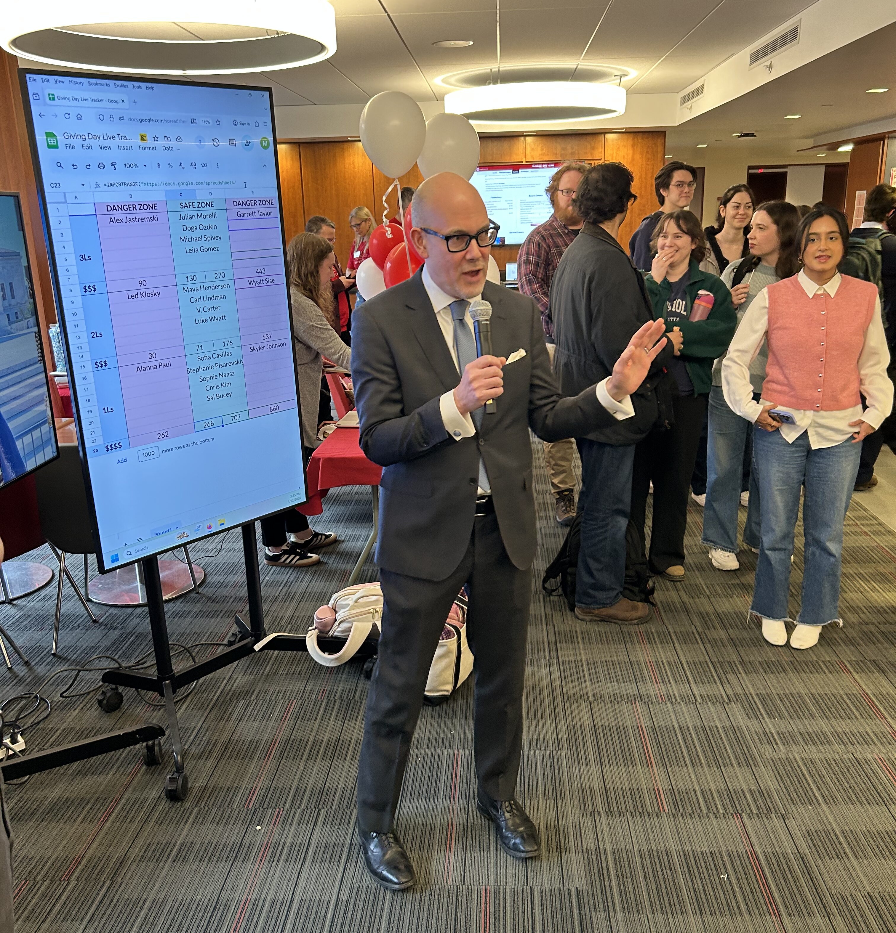 Dean Ohlin addressing students on Giving Day