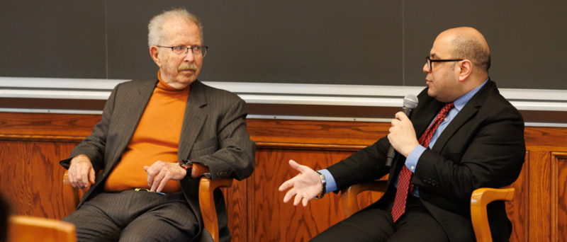 Devin Flores/Cornell University At right, Mohamed ‘Arafa, adjunct professor of law, talks with Menachem Z. Rosensaft, adjunct professor of law, about “The Urgency of Jewish-Muslim Dialogue” April 14 in Myron Taylor Hall at Cornell Law School.