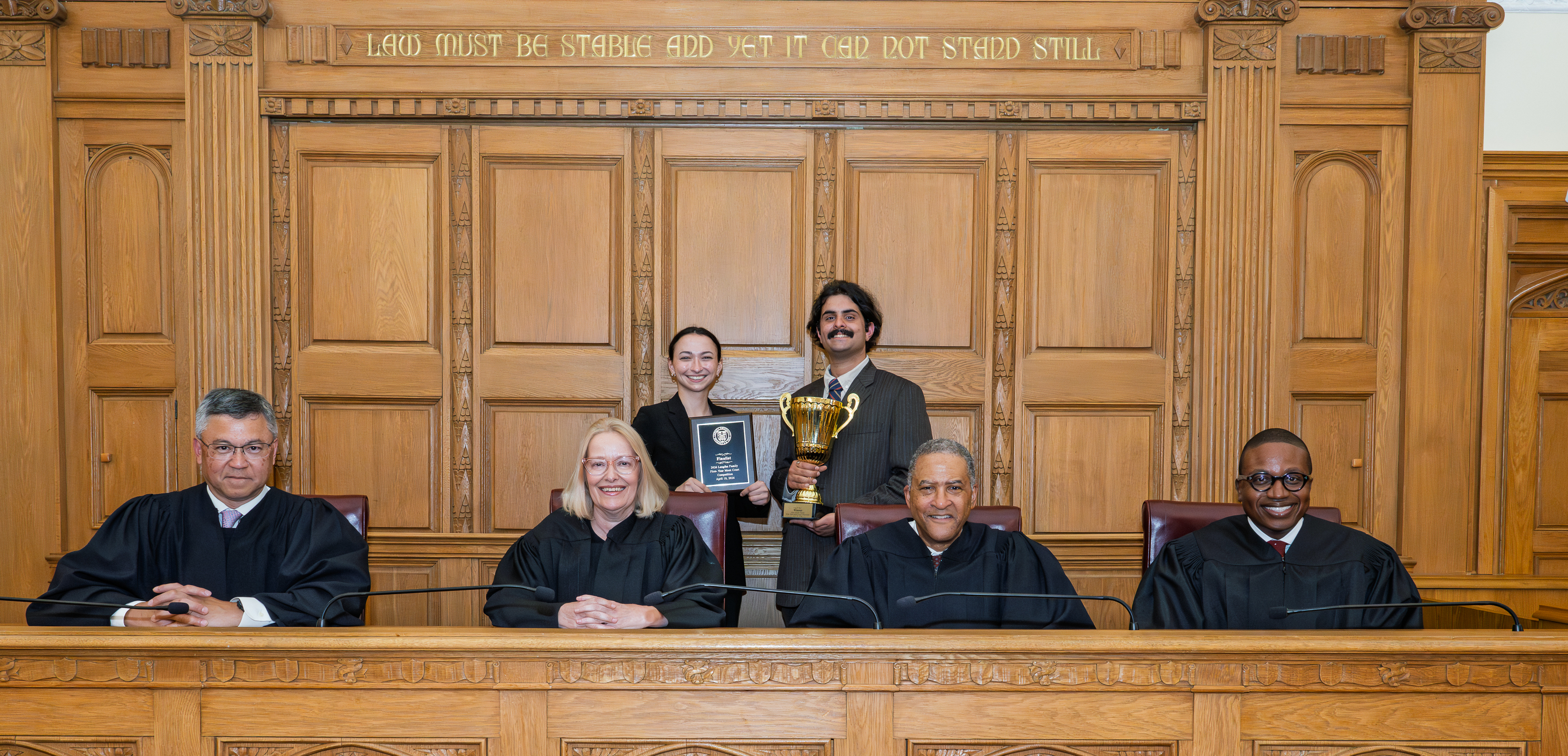 2026 Langfan Moot Court Finalist, Sarah Willis ‘28, and Champion, Vighnesh Mehrotra, with the final round judges: Hon. Derrick Watson, Hon. Stephanie Thacker, Hon. Raymond J. Lohier, and Hon. Embry Kidd.