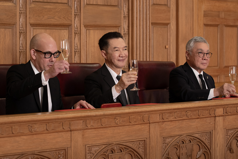 Toasting after the document signing.